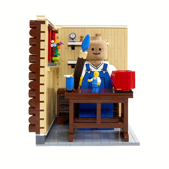 Figura de madera personalizada LEGO pintada como pintor en su taller