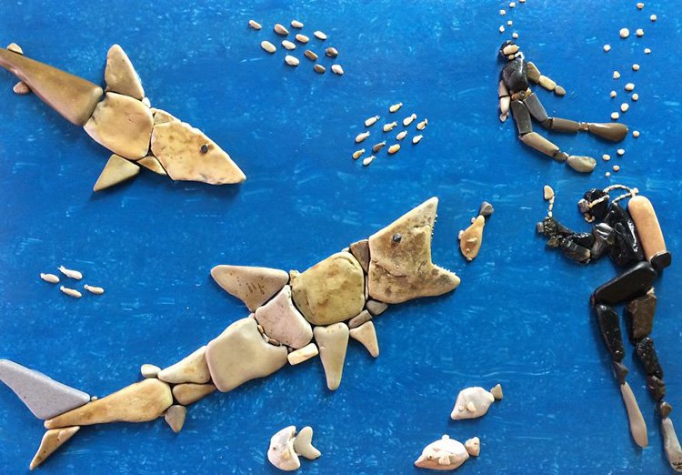 arte de buzo y piedra de tiburón