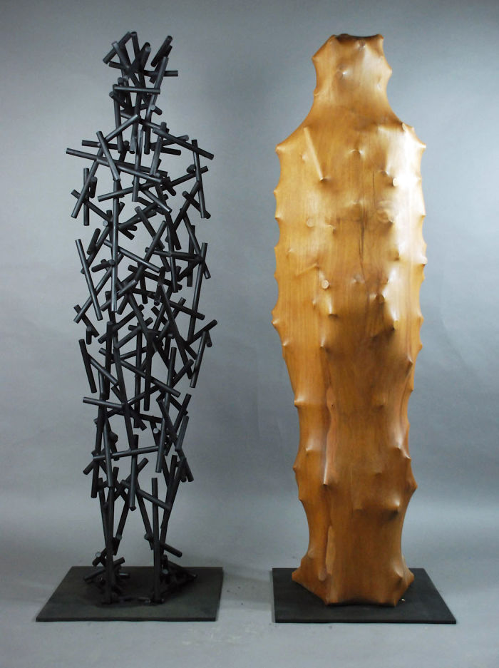 tung ming chin maravilloso concepto de madera esculturas de cuero