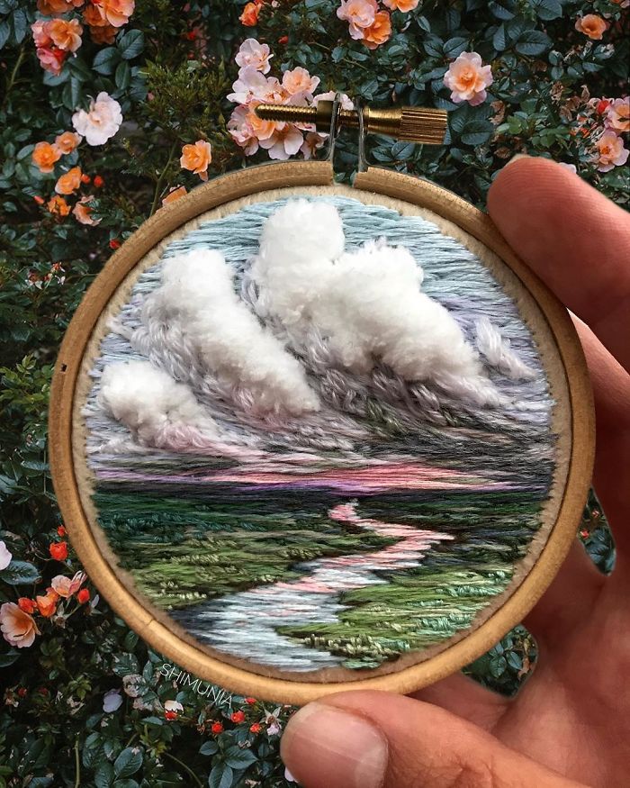shimunia bordado pintura río nubes