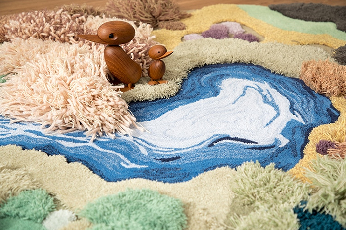 alfombra de sala de juegos definitiva con juguetes de pato de madera
