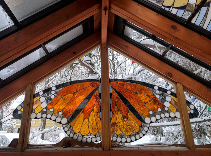 Detalles de la mariposa de la cabina de vidrieras