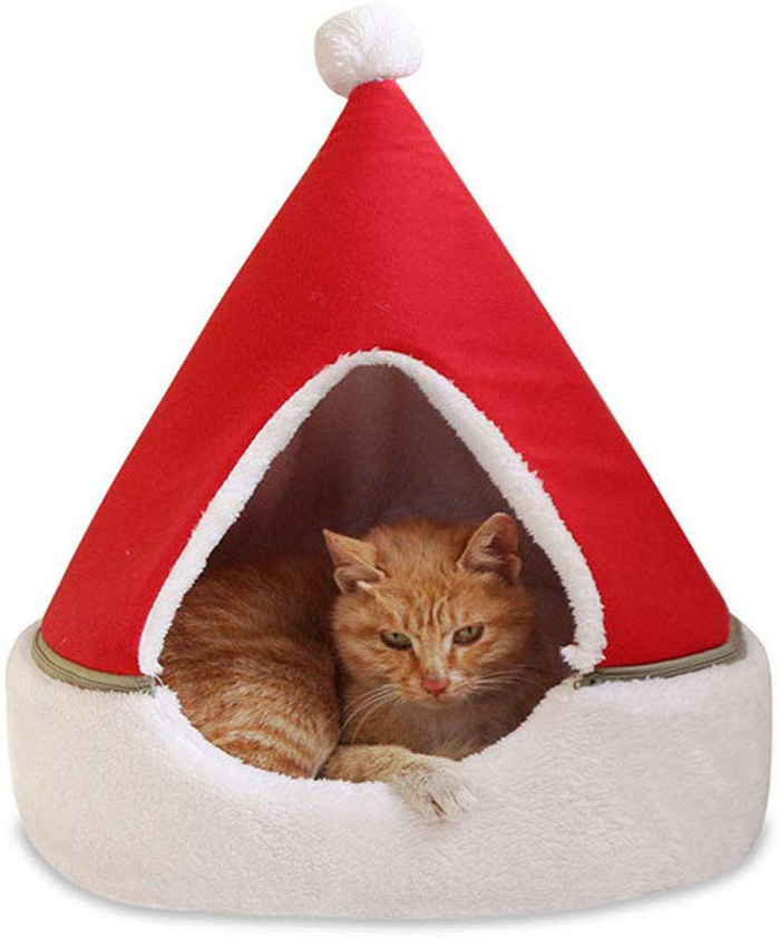 cama de gato árbol de navidad sombrero rojo de santa